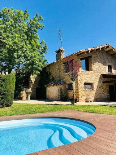 Masia with pool and beautiful views near Girona in Granollers De Rocacorba