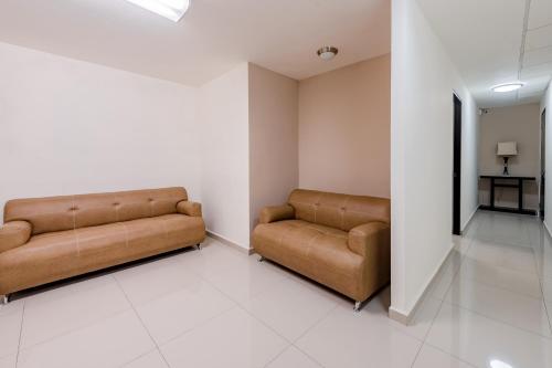 Ayenda Suites Ejecutivas Monterrey - Tap to explore photos