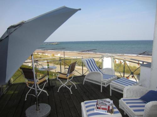 Haus Bischofsstab - Ferienwohnung am Meer in บัด โดเบรัน