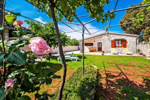 Charming House Nino with a fenced yard