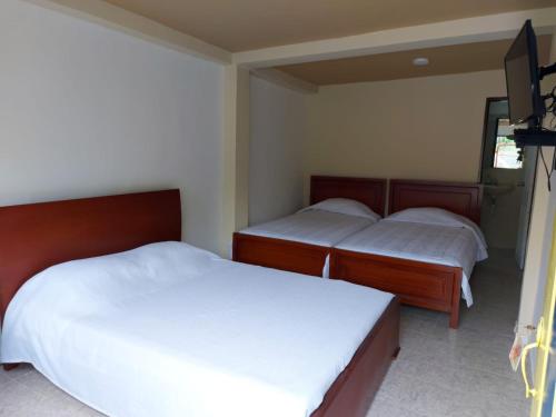 1 double bed, 3 twin beds