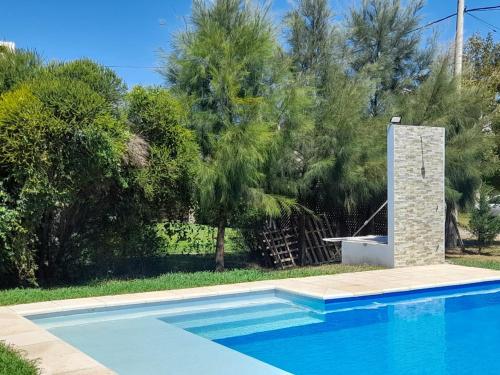 Swimming pool, Hermosa Casa en Roldan ideal Familias in Roldán