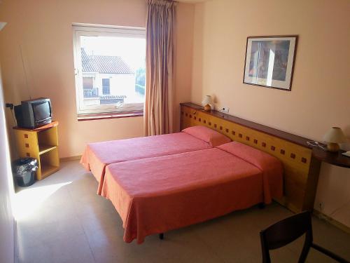 Chambre avec 2 lits