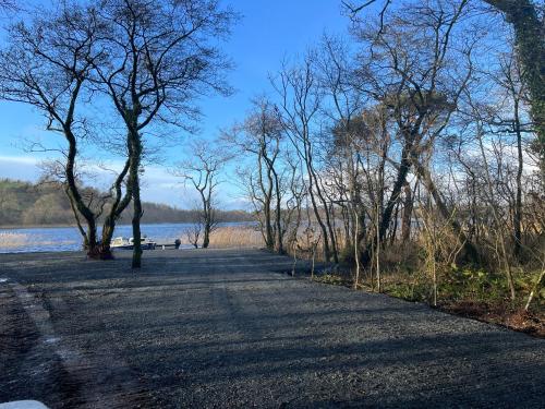 Cosy Lakeside Chalet With Option to add Private Hot Tub & Boat