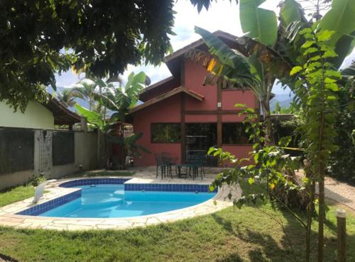 Casa de praia com piscina e clima de montanha