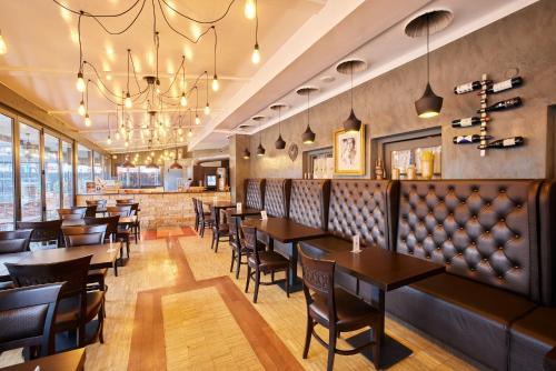 ห้องอาหาร, แอตลาส โพสต์โฮเทล (Atlas Posthotel) in การ์มิช-พาร์เทนเคียร์เชน