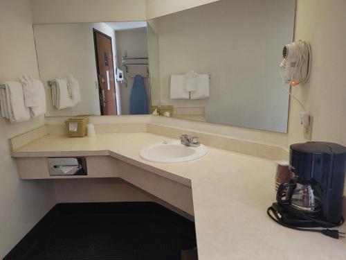 Ванная комната, Hotel Pigeon Forge in Пиджен Фордж (Теннесси)