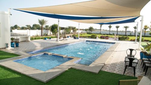 Swimming pool, Luxury Farm Villa in Musanaa Oman in Muladdah