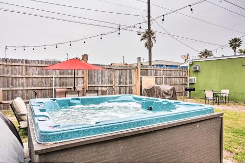 Walkable Galveston Apartment with Hot Tub Access