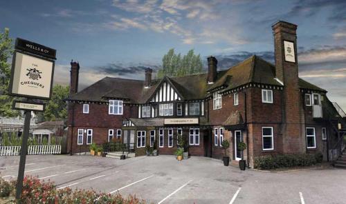 المنظر الخارجي, The Chequers Inn in ويلوان جاردن سيتي