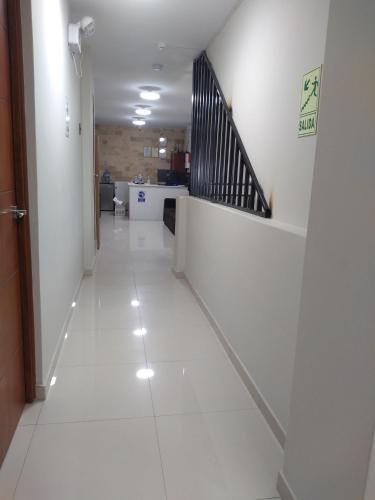 Előcsarnok, Hospedaje bolognesi in Piura