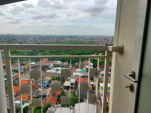 Balcony/terrace, Sunset View Studio Room MDN Free WiFi Full Furnish City and Lake View in Bekasi