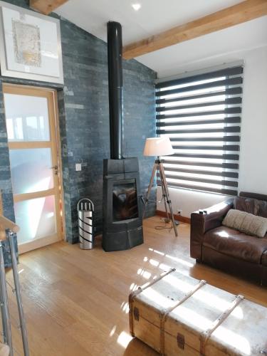 Maison et jardin confortable, à 200m du plan d'eau gîte à louer Baratier