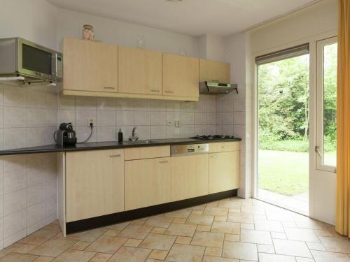 Kitchen, Tranquil Holiday Home in Lemele with Terrace in Lemele