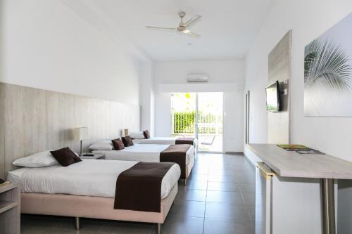 Comfort Quadruple Room room in Hotel Palma Verde