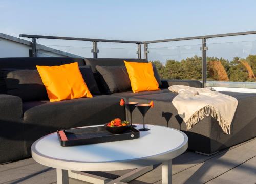 Penthouse mit Dachterrasse, Meerblick, Klimaanlage, Gasgrill, Kamin, Luxus-Design-Apartment, 2 Minuten zum Strand, Binz
