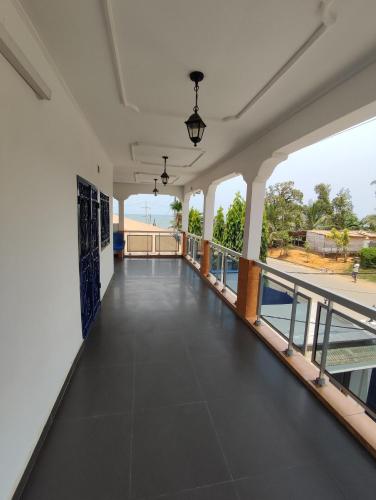 Balcony/terrace, Maison MIDAREA in Kribi