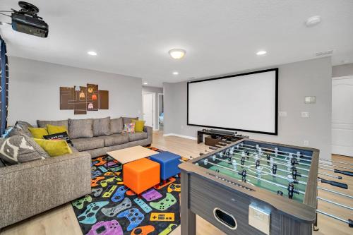 Beautiful contemporary decor with themed rooms, game room and theater