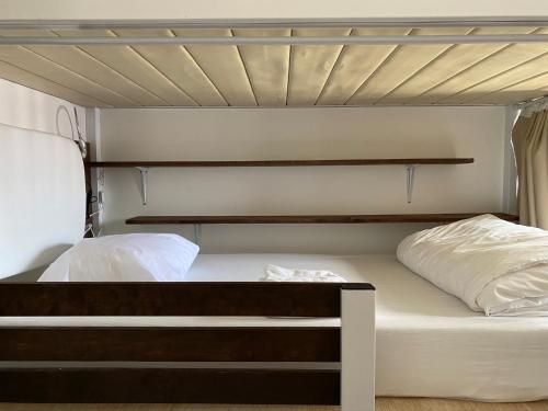 Bed in 6-Bed Female Dormitory Room