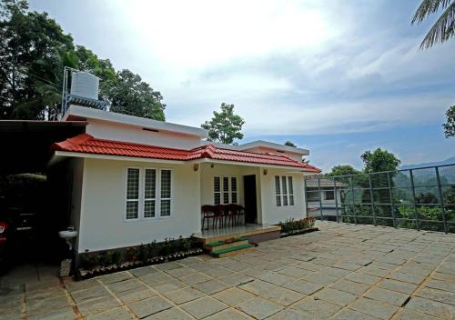 Croods Cottage Wayanad by Lexstays