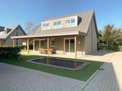 luxe Villa Maroma Regal aan Veerse meer met 4 Ebikes GasBBQ & EV laadpaal
