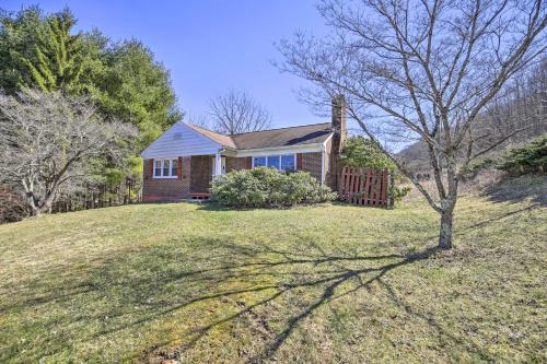 Quaint Creekside Home with Spacious Deck and Yard