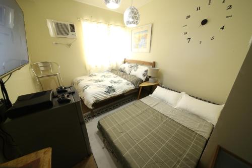 B&B Silang - A2J Executive Studio Suite Near Enchanted Kingdom - Bed and Breakfast Silang