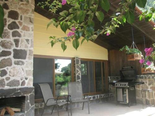 Casa BuenAventura - Cozy country cottage with wooden ceilings and stone walls within nature reserve