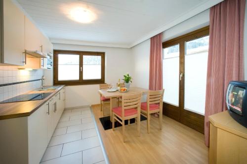 Two-Bedroom Apartment with Balcony and Mountain View