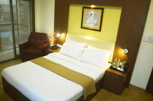 客室内ベッド, Hotel Arunachala in ティルヴァンナーマライ