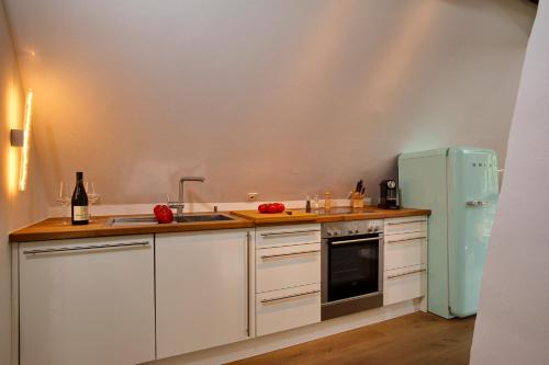 Kitchen, Weidemannhaus Wohnung 5 "Loft" in Keitum