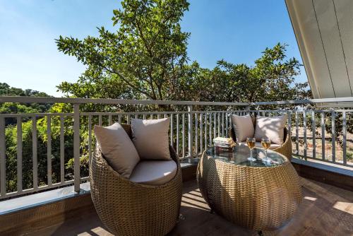 Balcony/terrace, SaffronStays Hillside Harriers, Lonavala - A Frame chalets with bathtub for couples in Lonavala