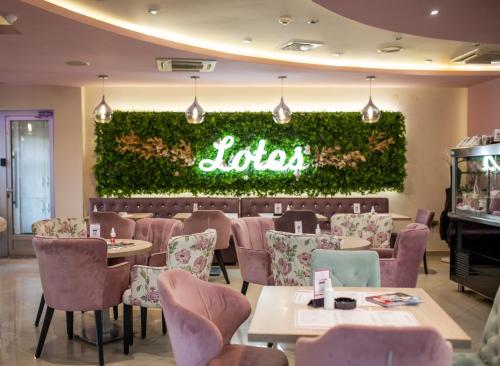 Garni Hotel Lotos - 레스토랑