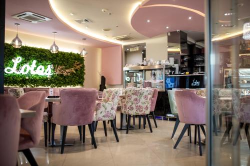 Garni Hotel Lotos - 레스토랑