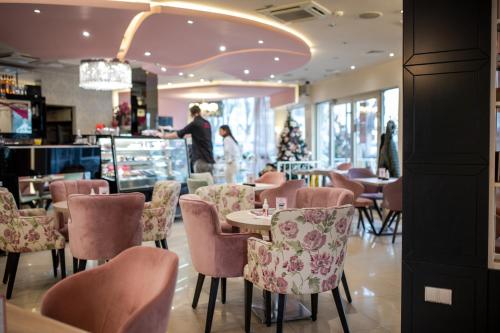 Garni Hotel Lotos - 레스토랑