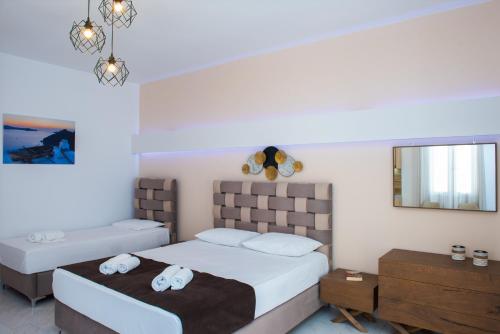Theodora Rooms - Tap to explore photos