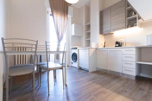 Via Torino Apartment 1 - Tap to explore photos