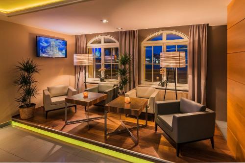 共用Lounge/電視區, 阿勒卡特酒店 (Hotel Alekto) in 弗萊貝爾格