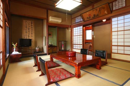 Japanese-Style Family Room with Shared Bath