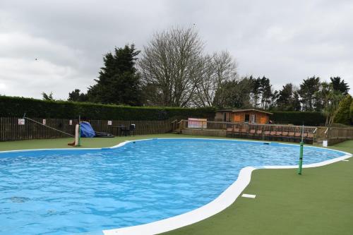 Swimming pool, Contemporary Caravan at Newquay Holiday Park in Trebarber