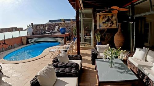  Anfi Opal Villa on Tauro Golf course and walk to Beach, Pension in La Playa de Tauro