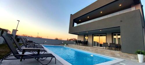Exterior view of Villa Tia with heated pool & jacuzzi