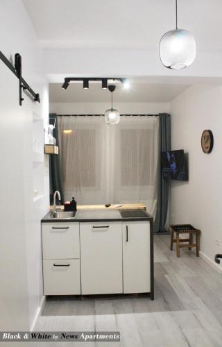 Black & White - News Apartment, Bucharest (photo 3)