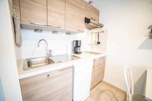 SUN7 STUDIO -FACE PLAGE- WIFI-PARKING -PISCINE - TOP PROS SERVICESConciergerieLaGrandeMotte