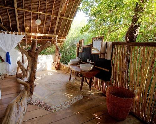 Shower, Fish Eagle Point in Tanga