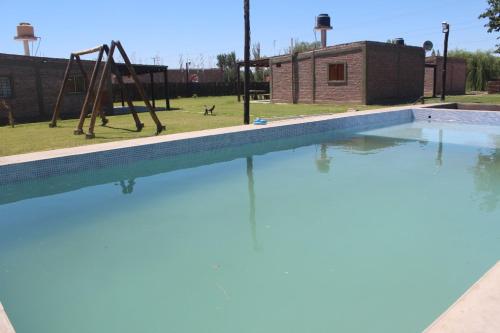 Garden, Cabanas Dona Antonia near Domingo Faustino Sarmiento Airport