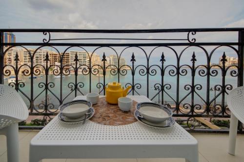 St Julians 2 Bedroom Apartment with Commanding Seaviews by ShortletsMalta