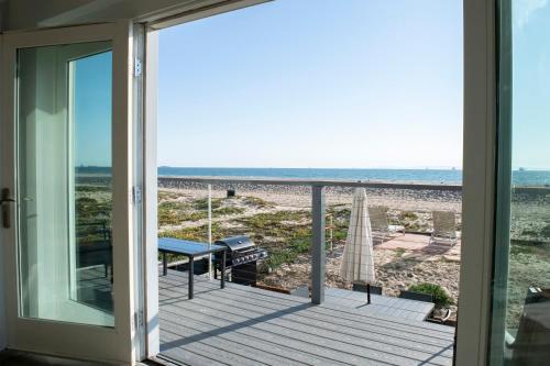 B&B Sunset Beach - Luxury Beachfront Condo - Endless Views - Surf 1 - Bed and Breakfast Sunset Beach