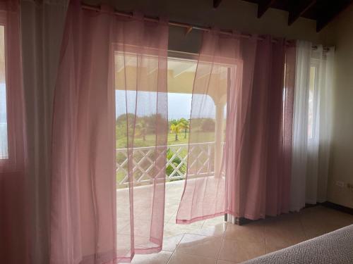 Altan/terrasse, 'PARLATUVIER' 4 bedroom ocean view home in Coles Pasture