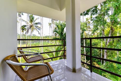 شرفة/ تراس, CentreHome Villa Wayanad in كانيامبيتا